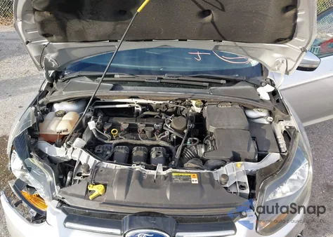 2013 Ford Focus Titanium z USA, uszkodzony, nr VIN 1FADP3J24DL369579